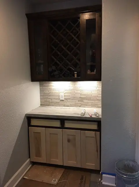 Wet bar with a built-in wine rack cabinet