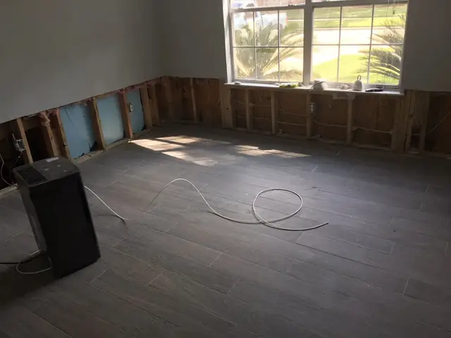 Flood-cut drywall in a room after Hurricane Harvey
