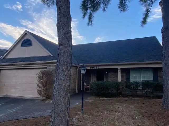 Finished re-roof on the front of a brick ranch home